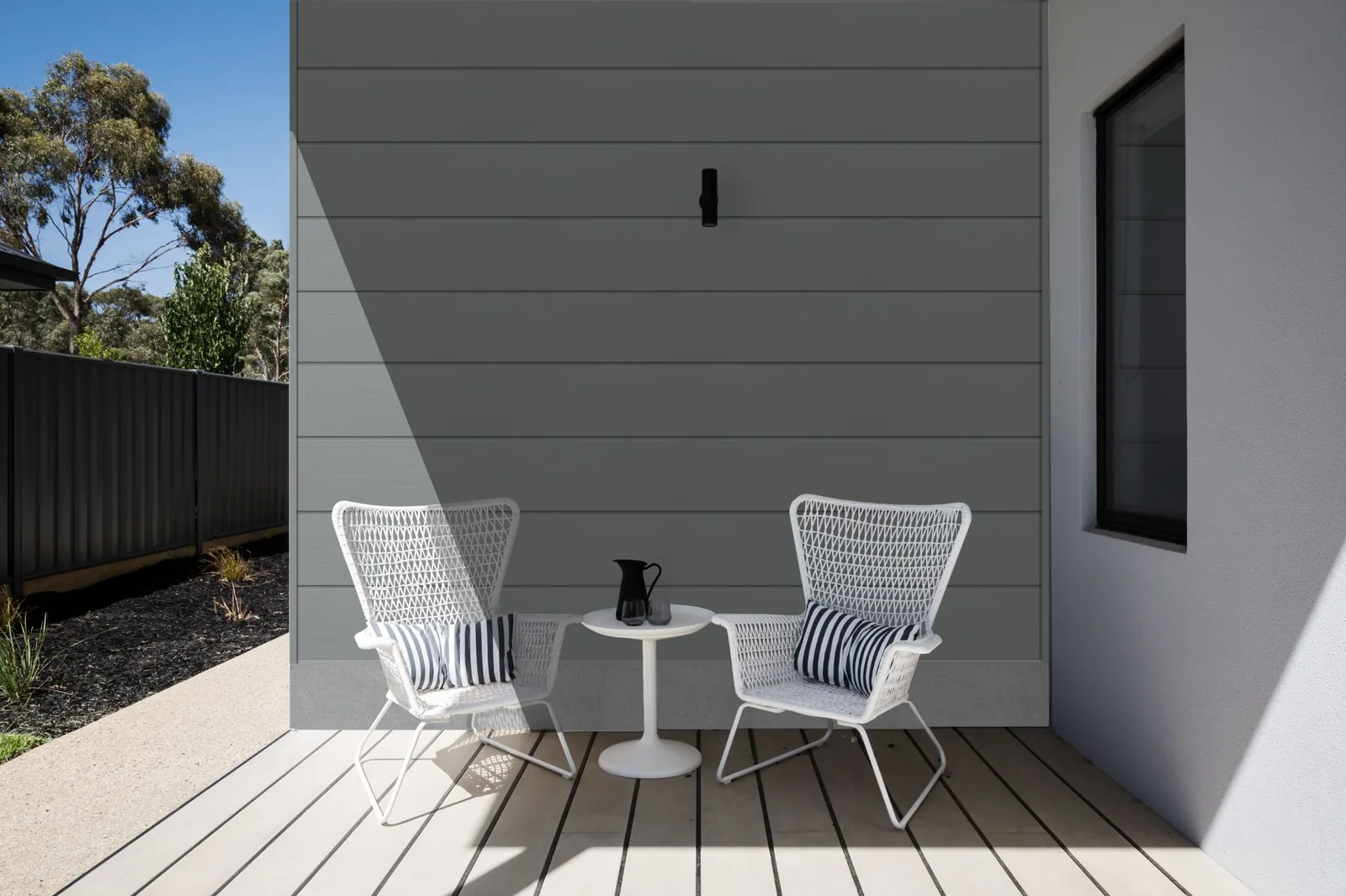 Fortex Clic horizontal storm grey cladding creating a dark contemporary wall